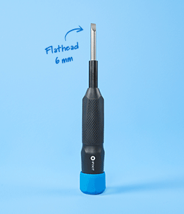 The Megalodon driver standing upright on a light blue background.
The animation shows the switch to each extended bit with a blue handwritten arrow and label pointing to the bit at the top.