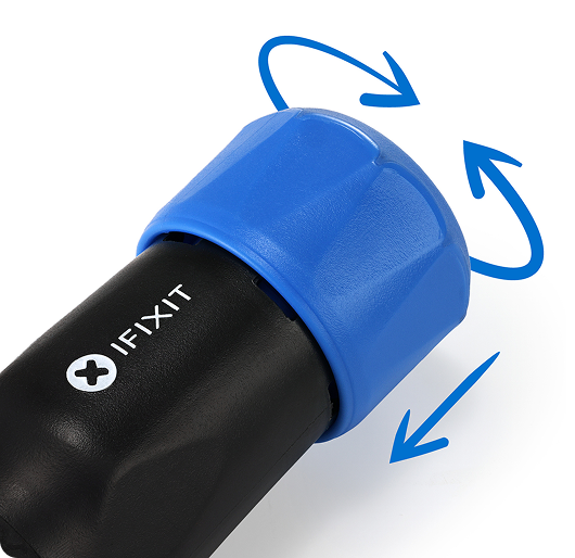 Close-up product graphic of the iFixit screwdriver handle with a blue rotating end cap, shown against a white background. Blue curved arrows around the cap indicate the push-and-spin motion.