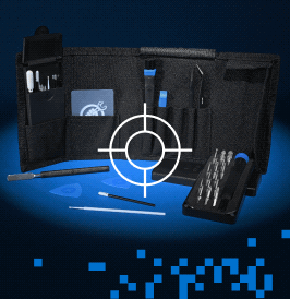 An open black iFixit Game Console Toolkit tool roll with precision tools and a bit case is arranged against a dark blue background. A white targeting graphic overlays the center, while blue pixel-like squares scatter across the lower edge.