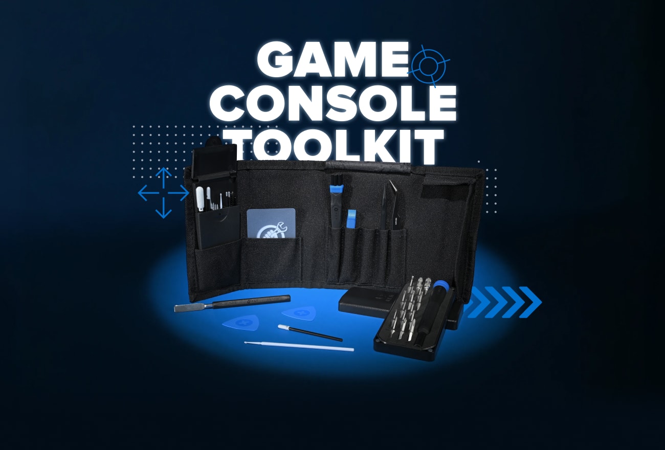 Game Console Toolkit displayed open against a dark blue background, with drivers, bits, opening picks, brushes, and other repair tools arranged in front. Large white text reading “Game Console Toolkit” fills the upper background, accented by blue gaming-inspired graphics.