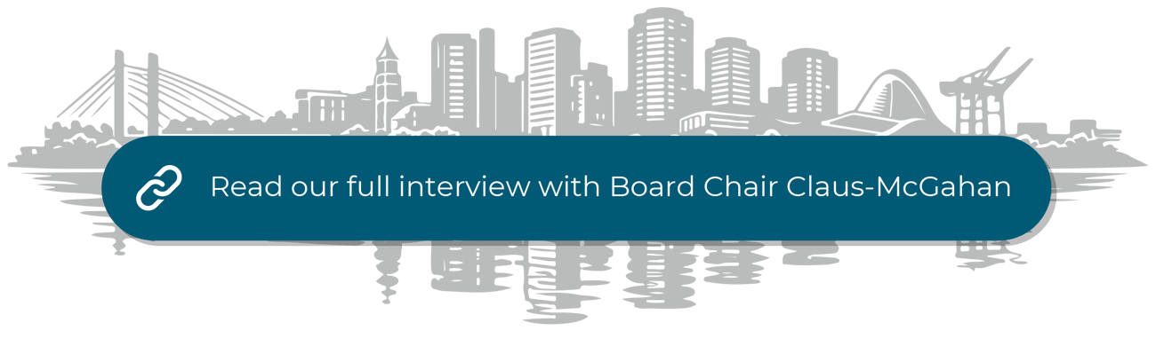 Stylized city skyline with buildings and a bridge. Teal rectangle overlay with text: "Read our full interview with Board Chair Claus-McGahan."