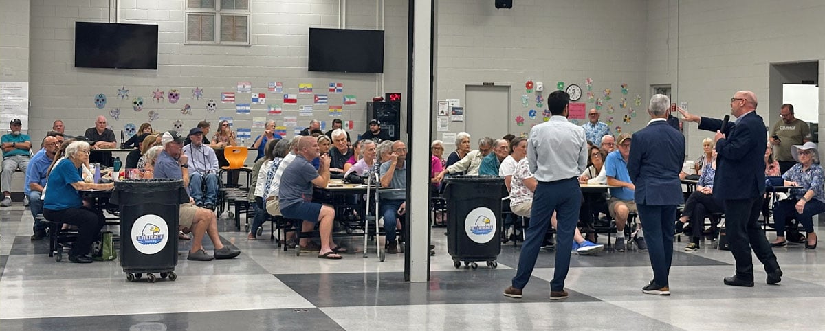 A crowd of residents attending a community meeting