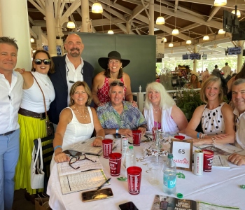 people dressed up for Travers Day hospitality area