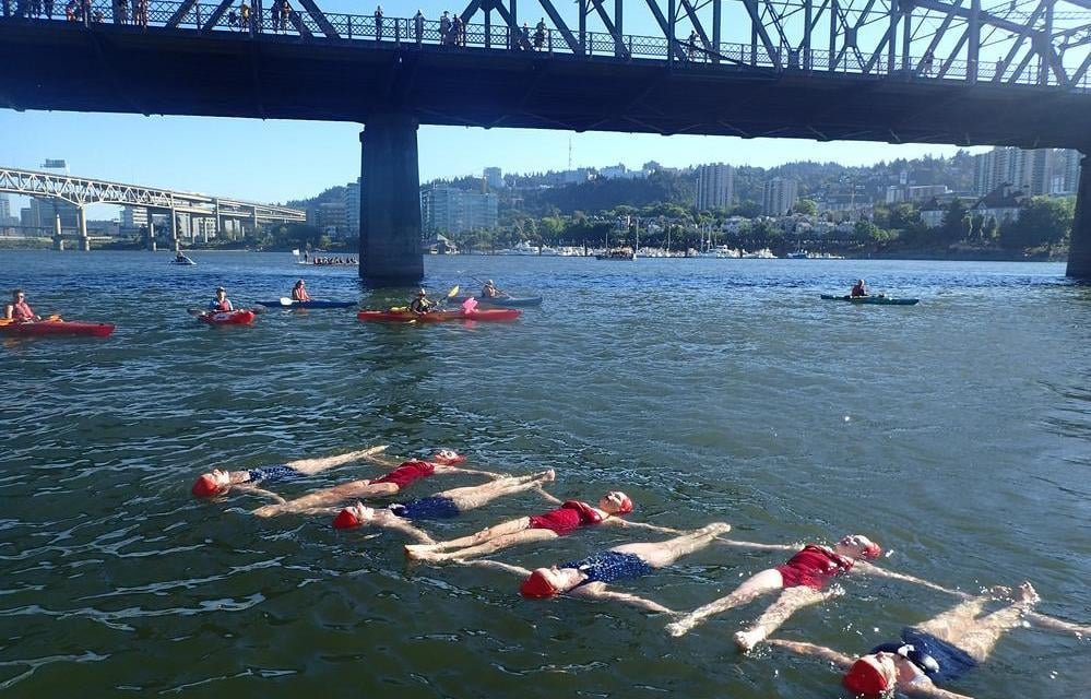swimmers in the river swimmers in the river