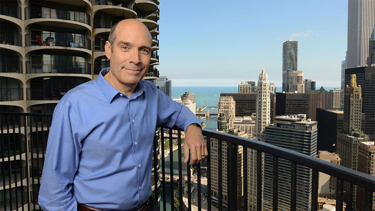 Host Geoffrey Baer on balcony at Marina City Host Geoffrey Baer on balcony at Marina City