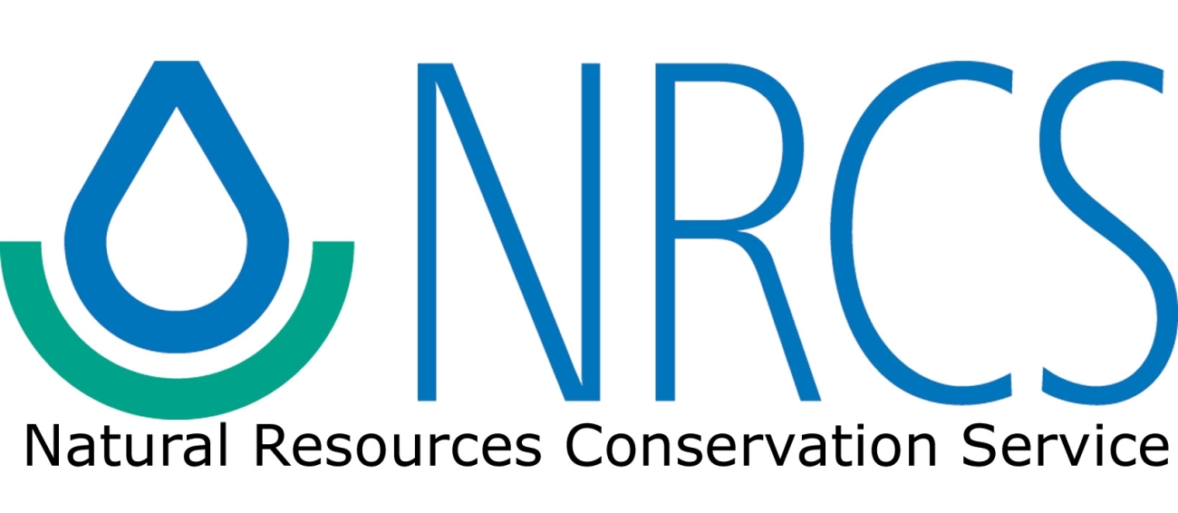 The official logo for the Natural Resources Conservation Service (NRCS). It features a stylized blue water droplet cradled by a green semi-circle on the left, with the large blue letters "NRCS" and the full name "Natural Resources Conservation Service" written in black below.