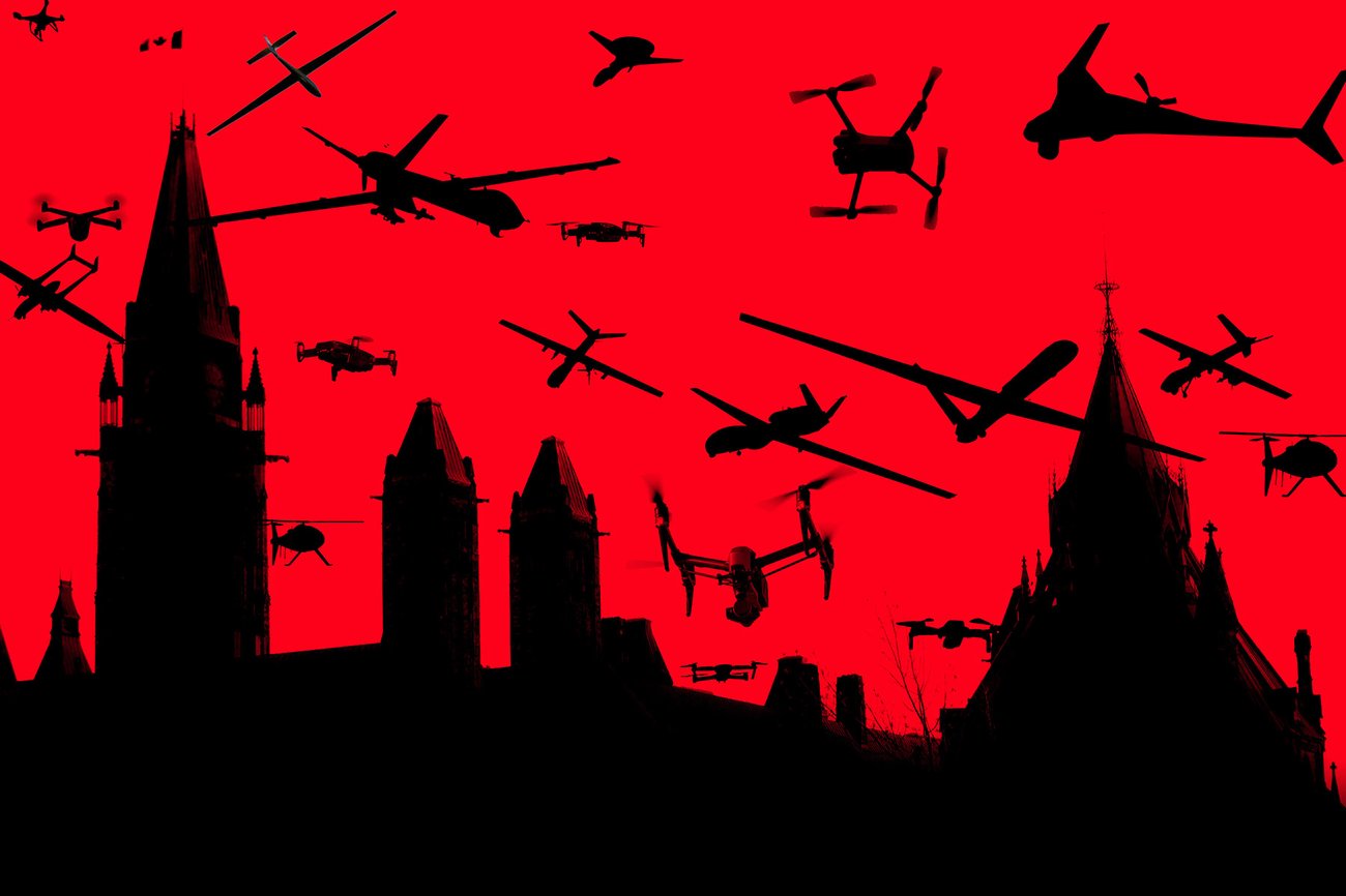 Photo illustration shows a number of drone silhouettes flying against a deep-red sky