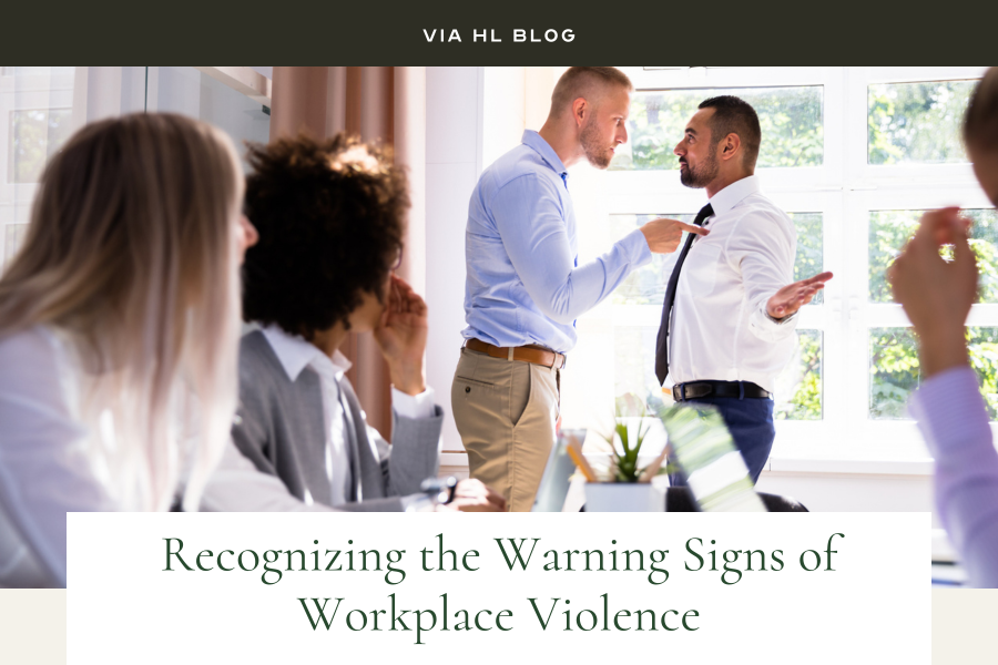 Via HL Blog image: two men in the workplace in an argument, text:"Recognizing the warning signs of workplace violence."