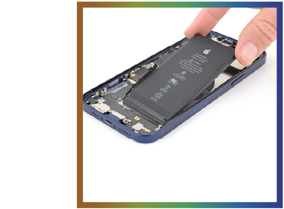 Hand lifting the battery out of an opened iPhone.