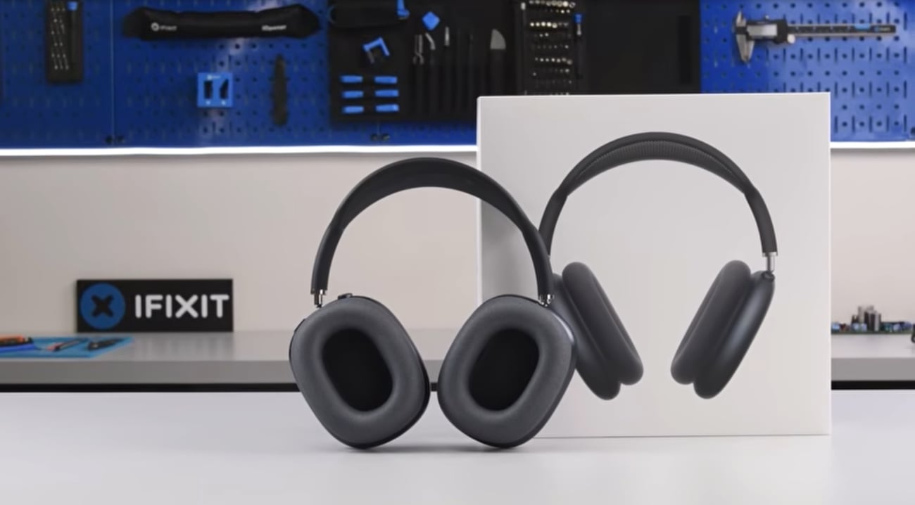 A pair of AirPods Max 2 sitting on our teardown table.