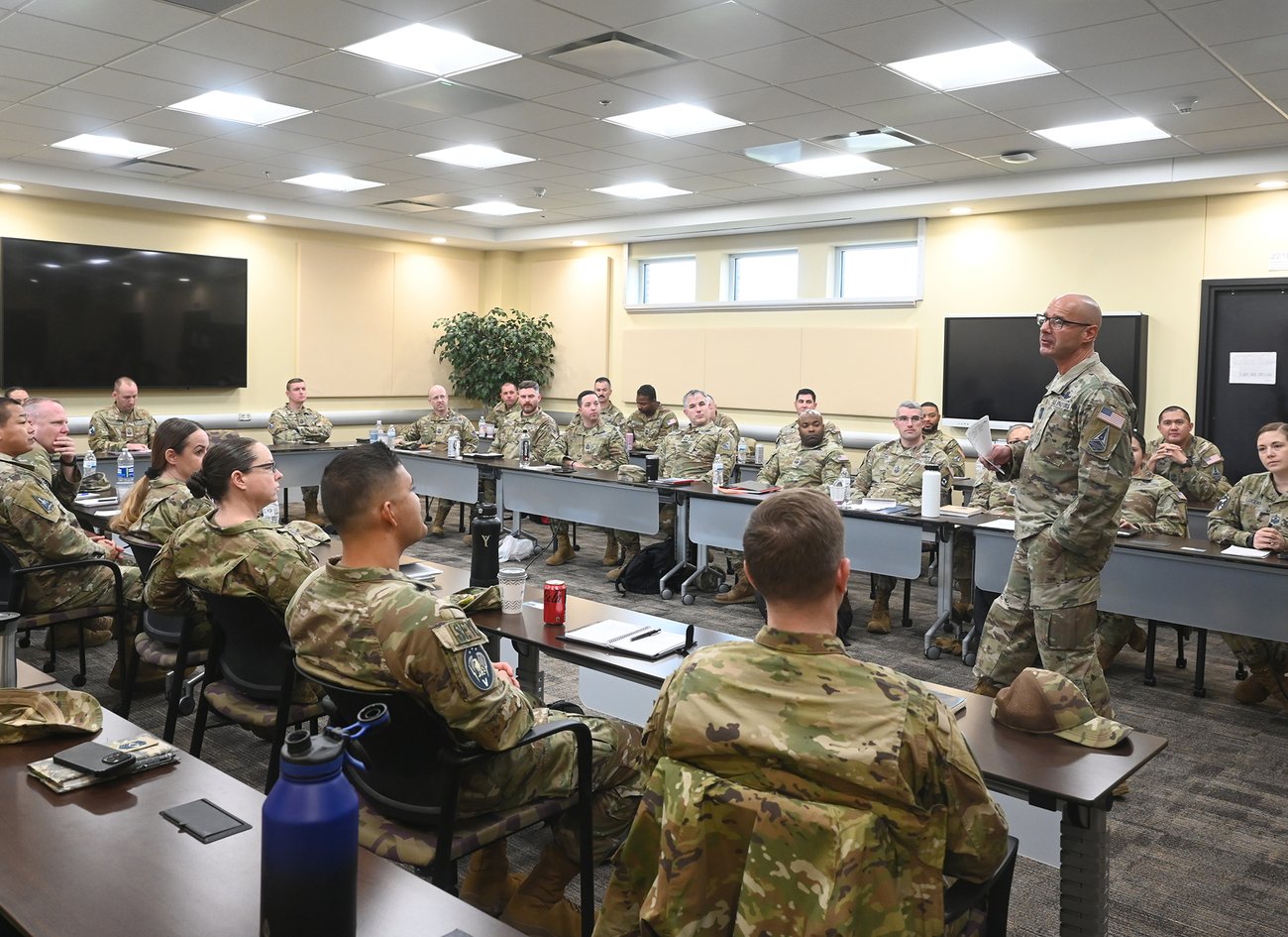 Chief Master Sgt. of the Space Force John Bentivegna addresses an audience of recently promoted guardians at the Space Force Chief Master Sergeant Orientation Course at Joint Base Andrews, Md., April 1, 2024. During the interaction, Bentivegna discussed several topics including the importance of teamwork and accountability. (U.S. Air Force photo by Andy Morataya)