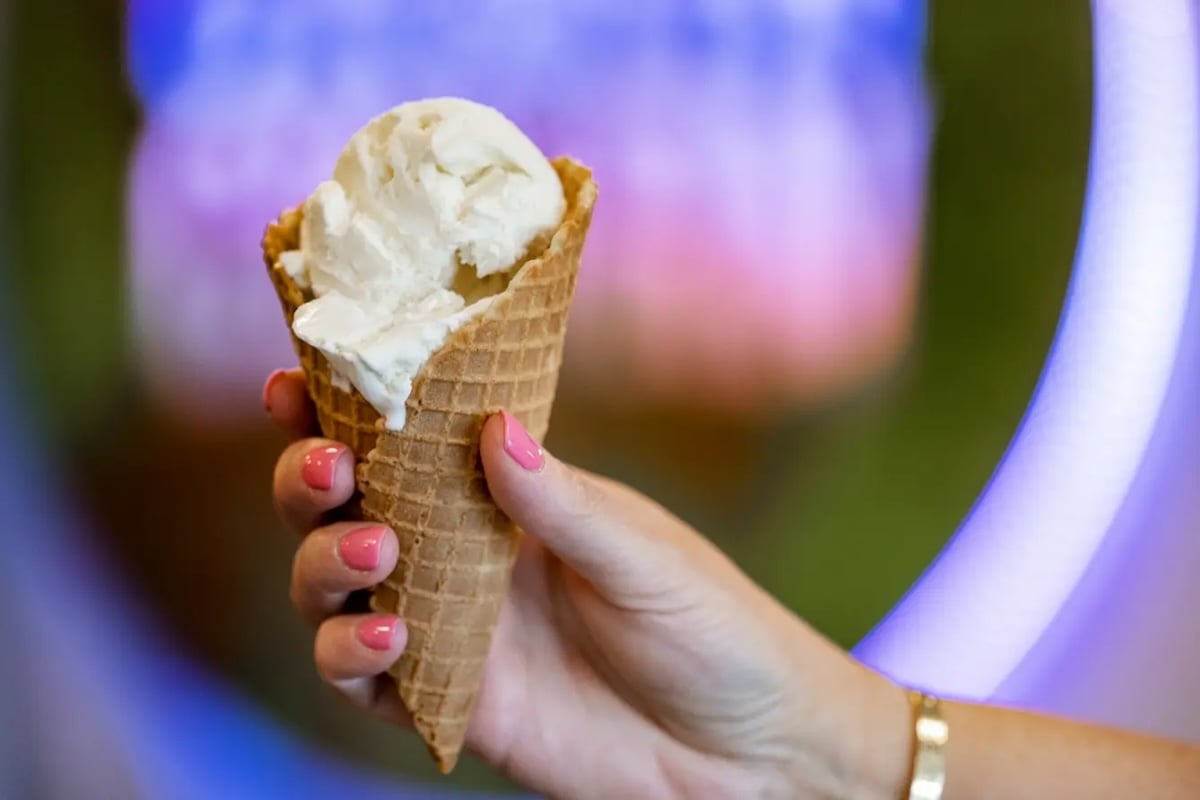 An ice cream cone in a hand