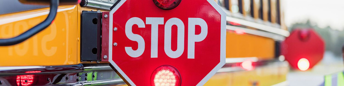Bus with stop signs pulled out and flashing Bus with stop signs pulled out and flashing