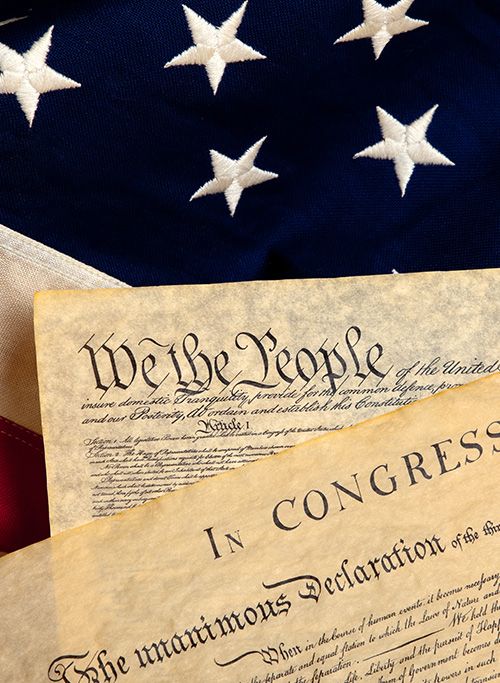 American Flag with copies of Declaration of Independence