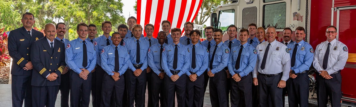 Fire Graduates standing together with training staff