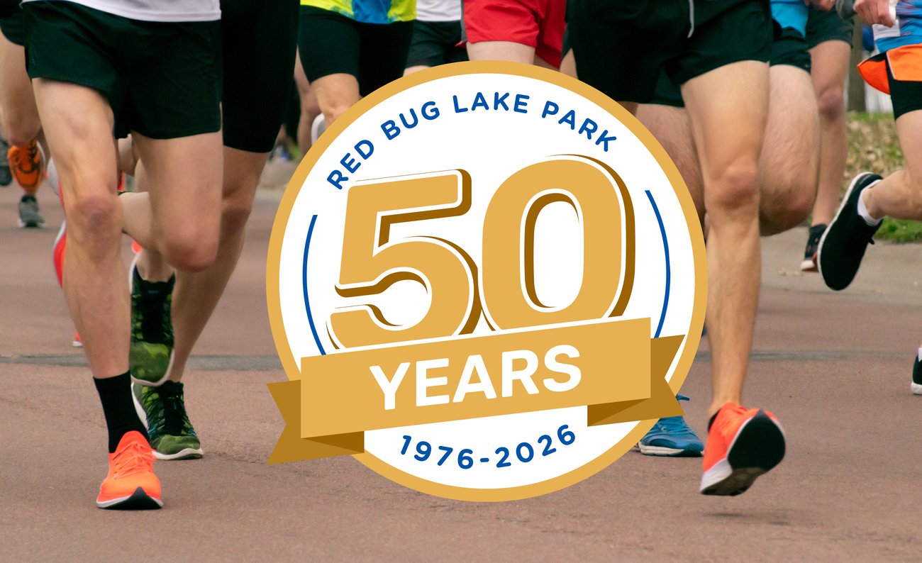 Red bug 50th with people running Red bug 50th with people running