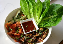 a dish with lettuce leaves a dish with lettuce leaves