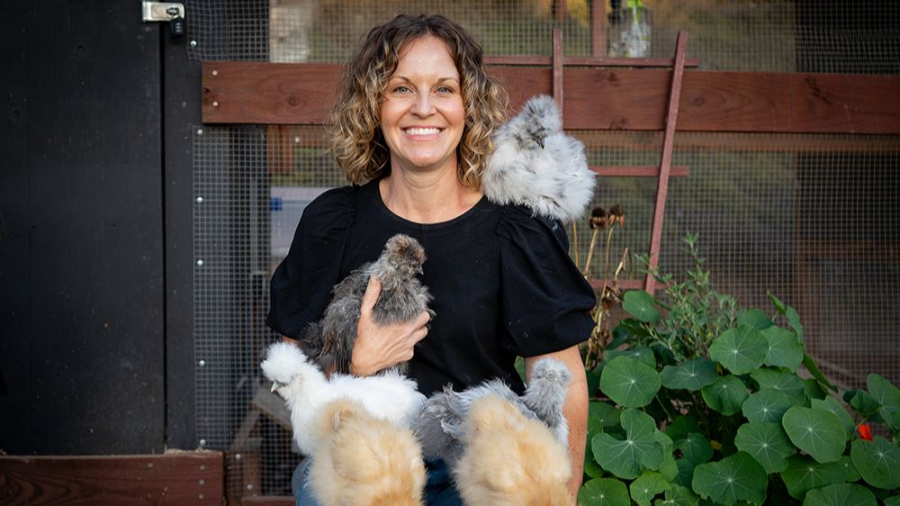 Laura McLean holding chicken