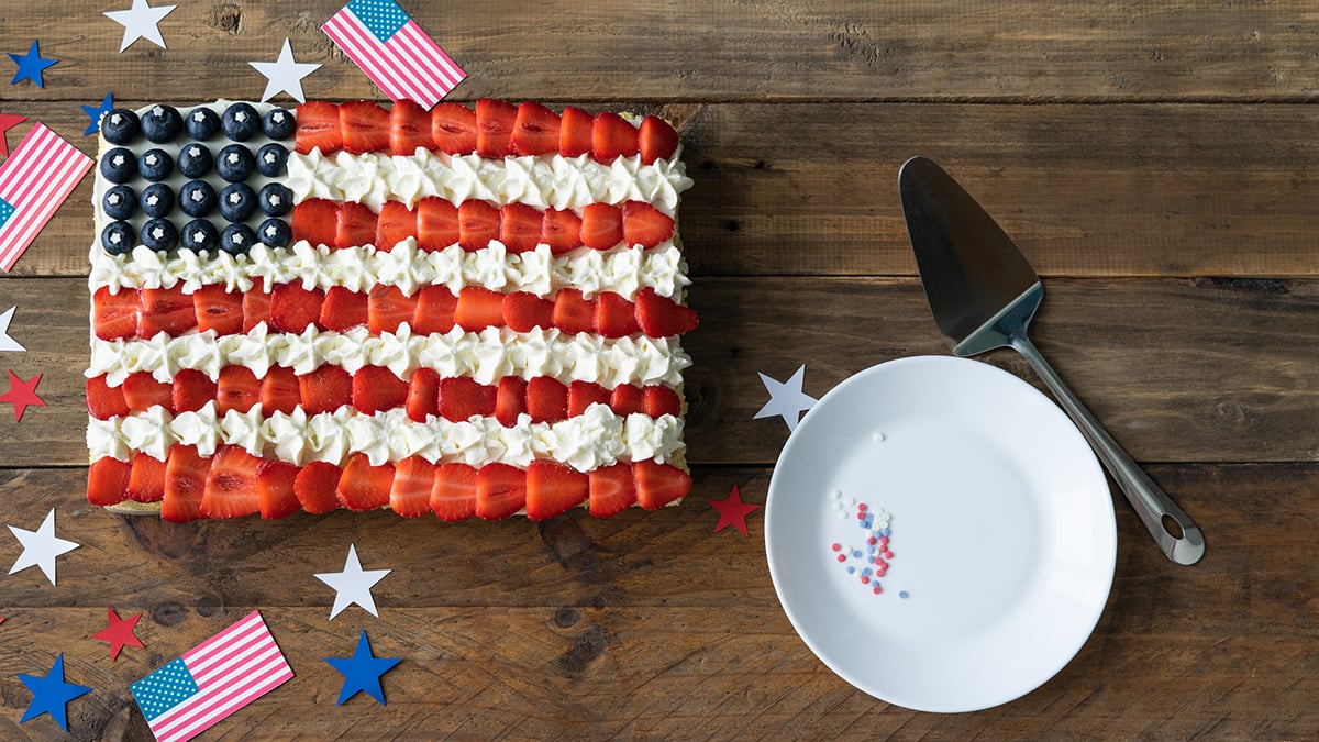 American flag dessert pizza and white plate