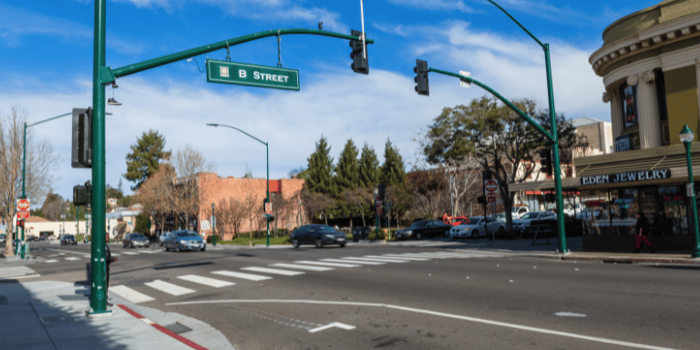 Photo of B Street and Mission, a busy intersection in downtown Hayward.