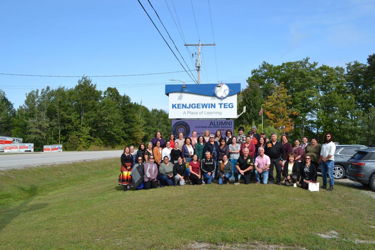 A group of people holding hands to form a circle
