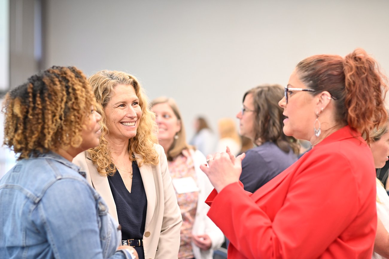 Attendees having a conversation at the ECN Student-Centered Coaching Series with Diane Sweeney 