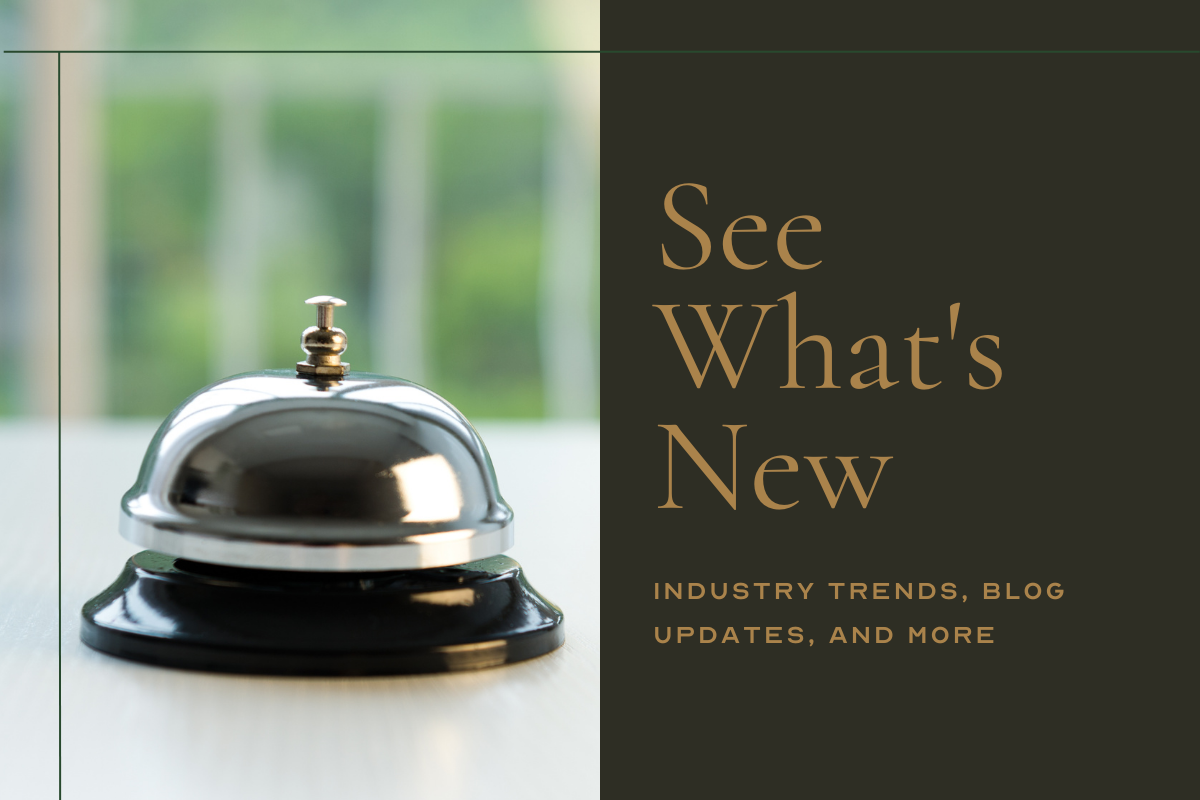 See What's New Industry Trends, Blog Updates, And More image: close-up of a silver service bell against a blurred green and white background