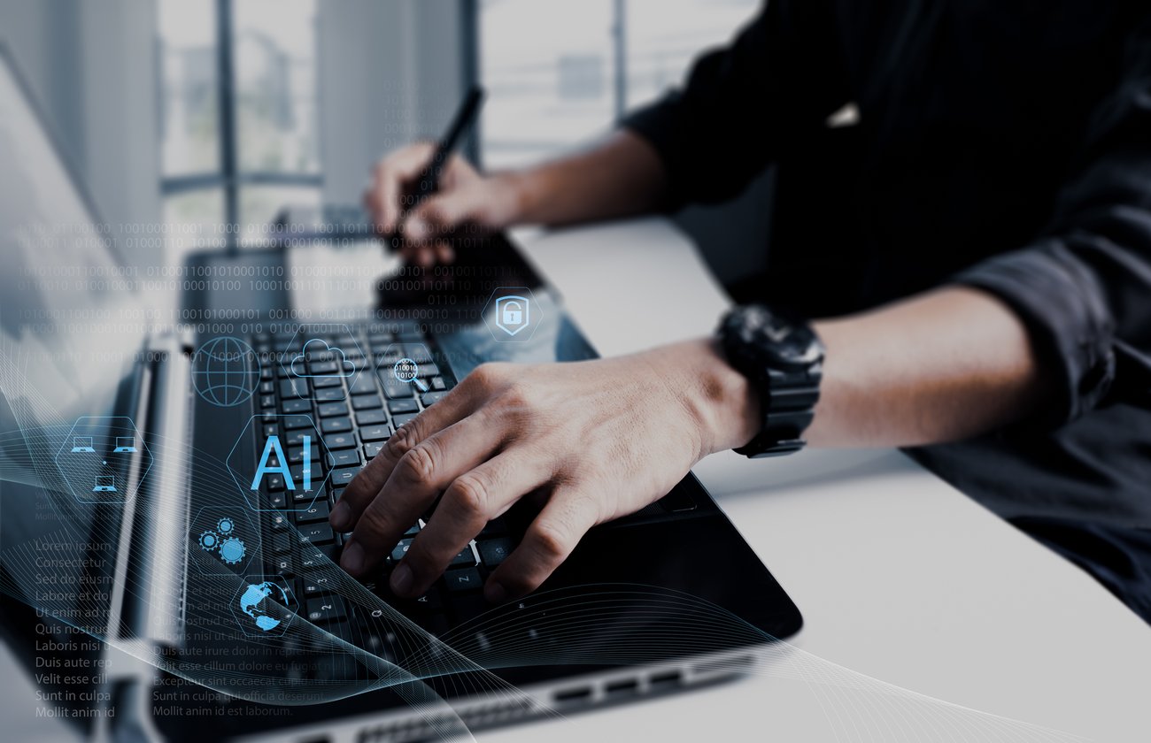 Man searching on computer with AI