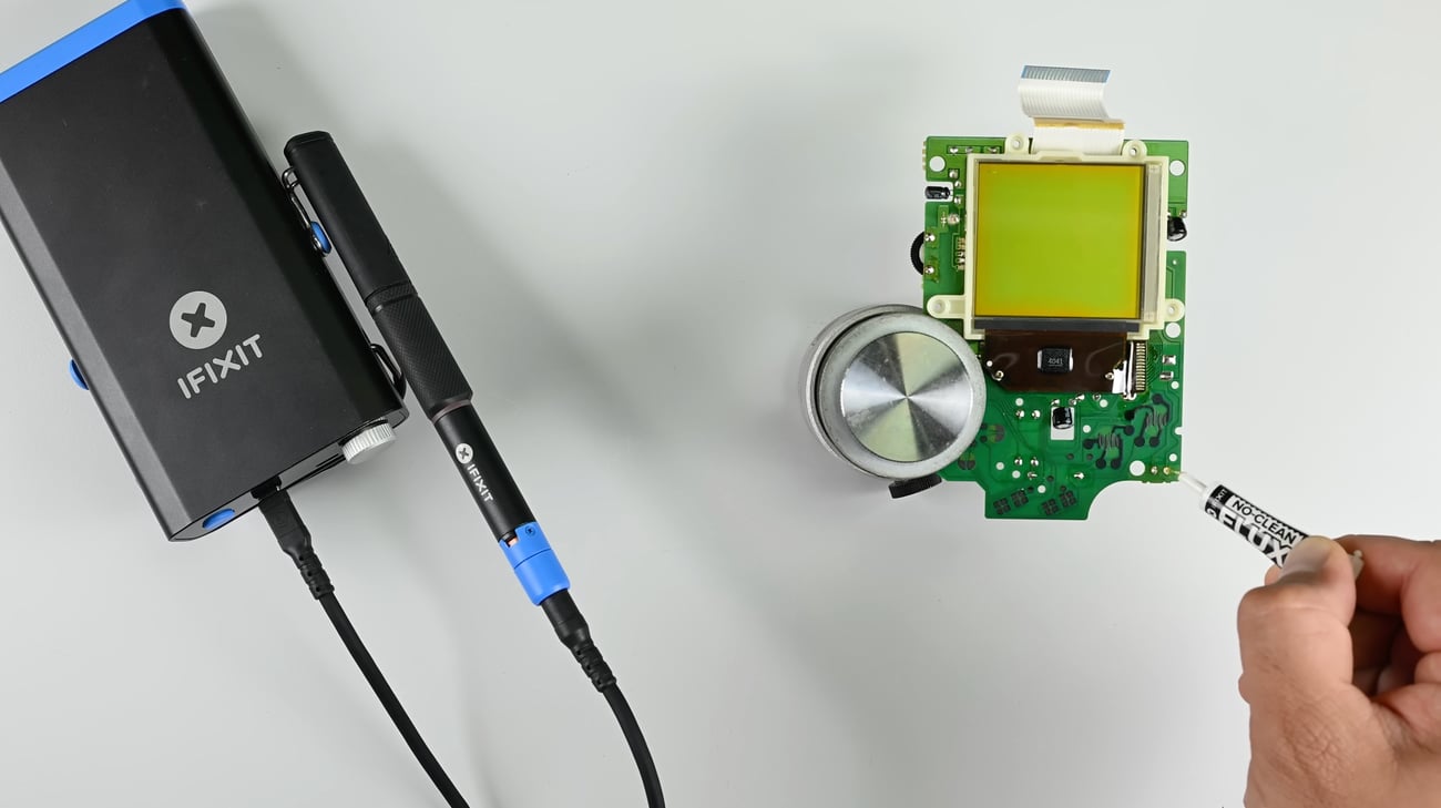 Soldering a new speaker on to a Game Boy motherboard using the FixHub Soldering Station