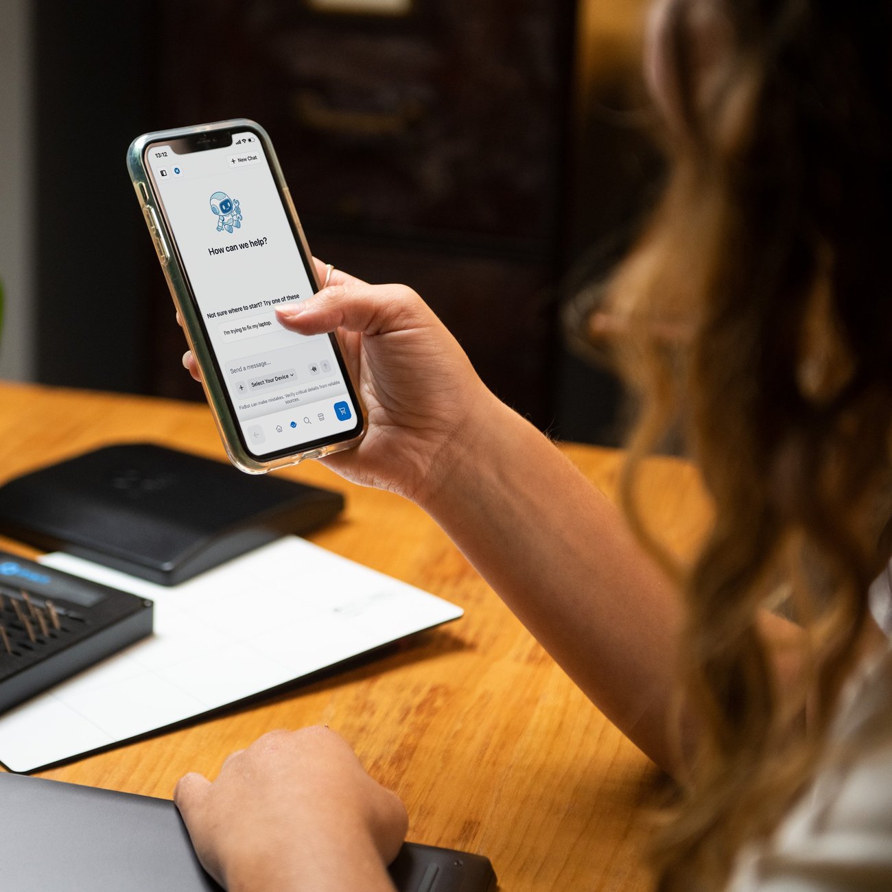 A person accesses FixHub from their smartphone