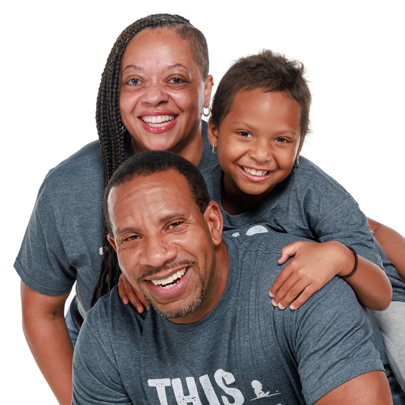 Teen girl wearing a dress and smiling. 