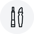 Light grey circular icon featuring two black outlined tools—one resembling a screwdriver and the other a curved prying tool—standing upright side by side on a solid background.