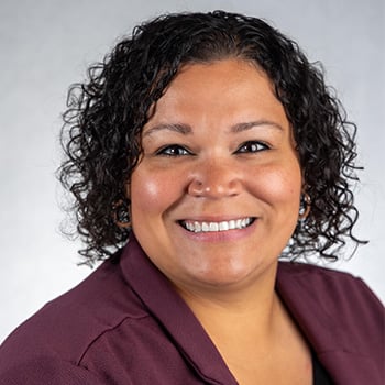 Portrait of Addie Trettel in maroon jacket
