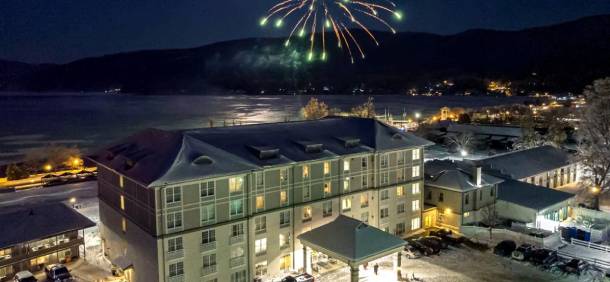 fireworks over fort william henry hotel in winter