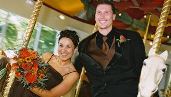groomsmen and bridesmaid on carousel