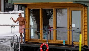 people in floating sauna people in floating sauna