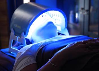 person getting led facial