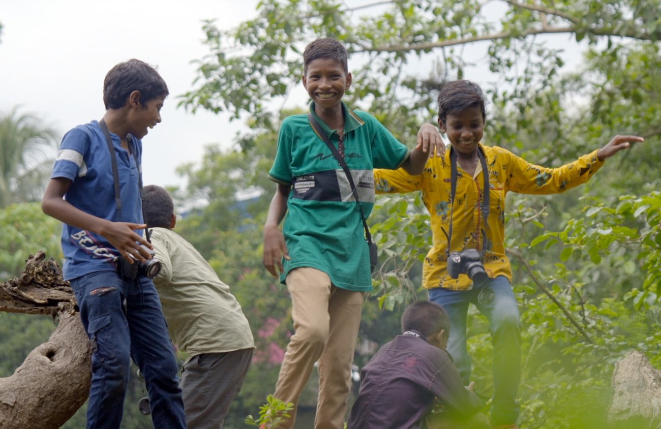 Ajoy, Lalu, and Surajit (left to right), exploring outdoors with their cameras. – Photo by Ashwika Kapur Ajoy, Lalu, and Surajit (left to right), exploring outdoors with their cameras. – Photo by Ashwika Kapur