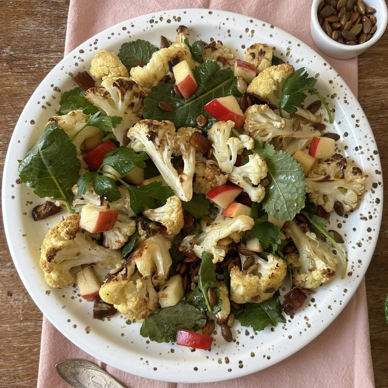 Roasted Cauliflower Salad With Kale, Dates, and Pepitas, in a Lemon Vinaigrette