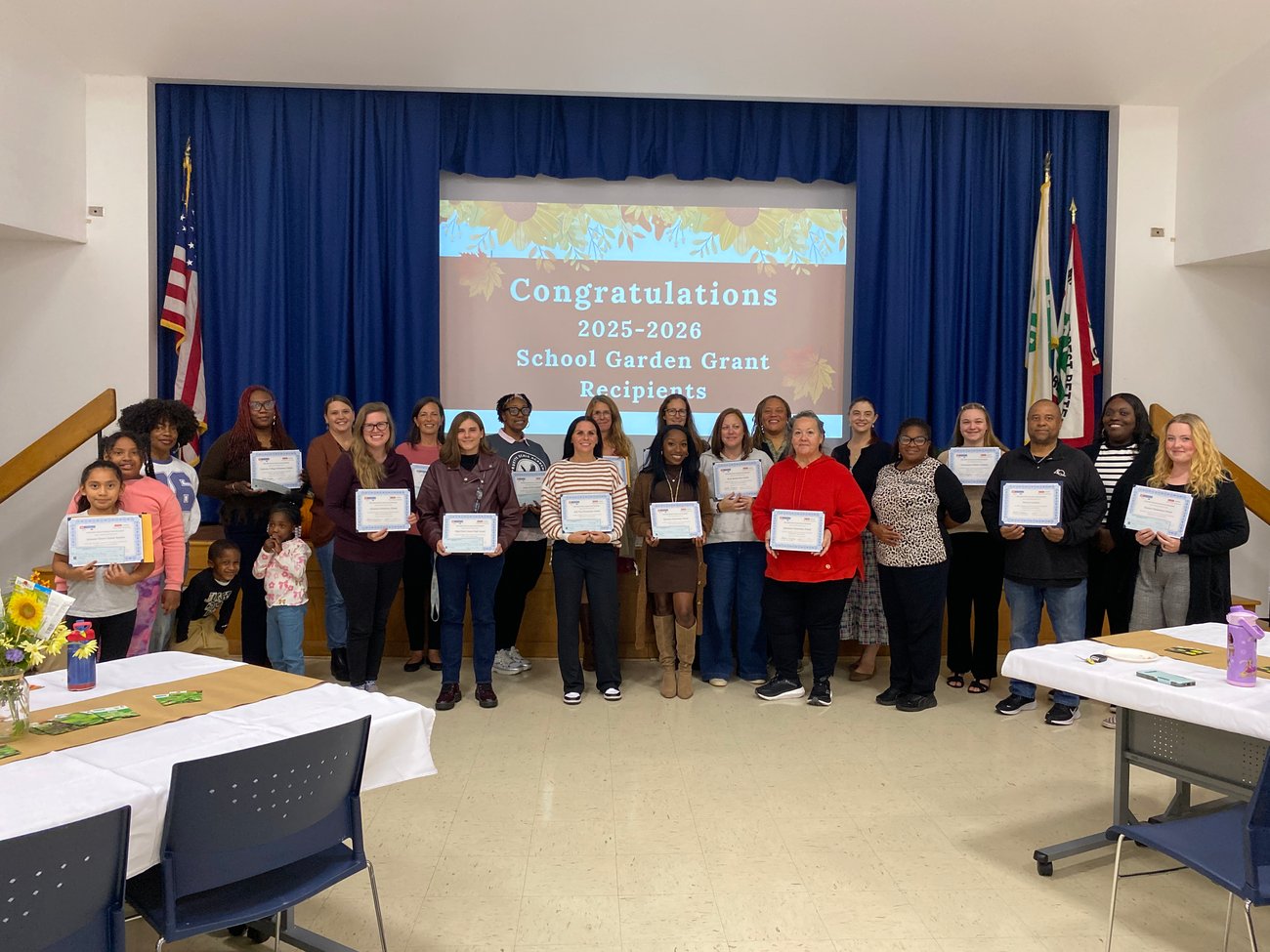 Photo from NC Cooperative Extension Guilford County Center Open House. People conversing and visiting information tables in the lobby. Photo from NC Cooperative Extension Guilford County Center Open House. People conversing and visiting information tables in the lobby.
