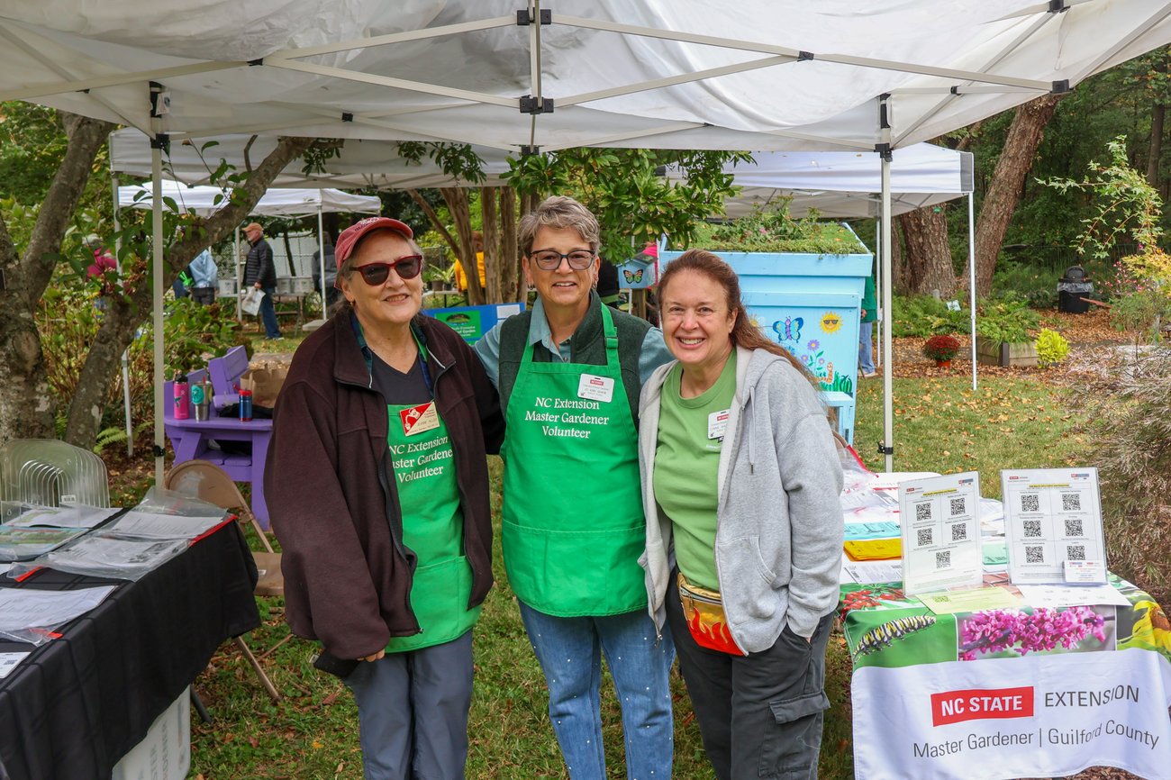 Photo from NC Cooperative Extension Guilford County Center Open House. People conversing and visiting information tables in the lobby. Photo from NC Cooperative Extension Guilford County Center Open House. People conversing and visiting information tables in the lobby.