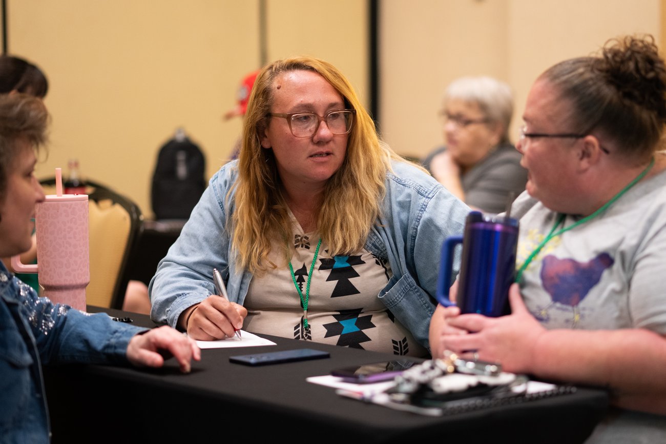 Two Volunteer Leaders talking