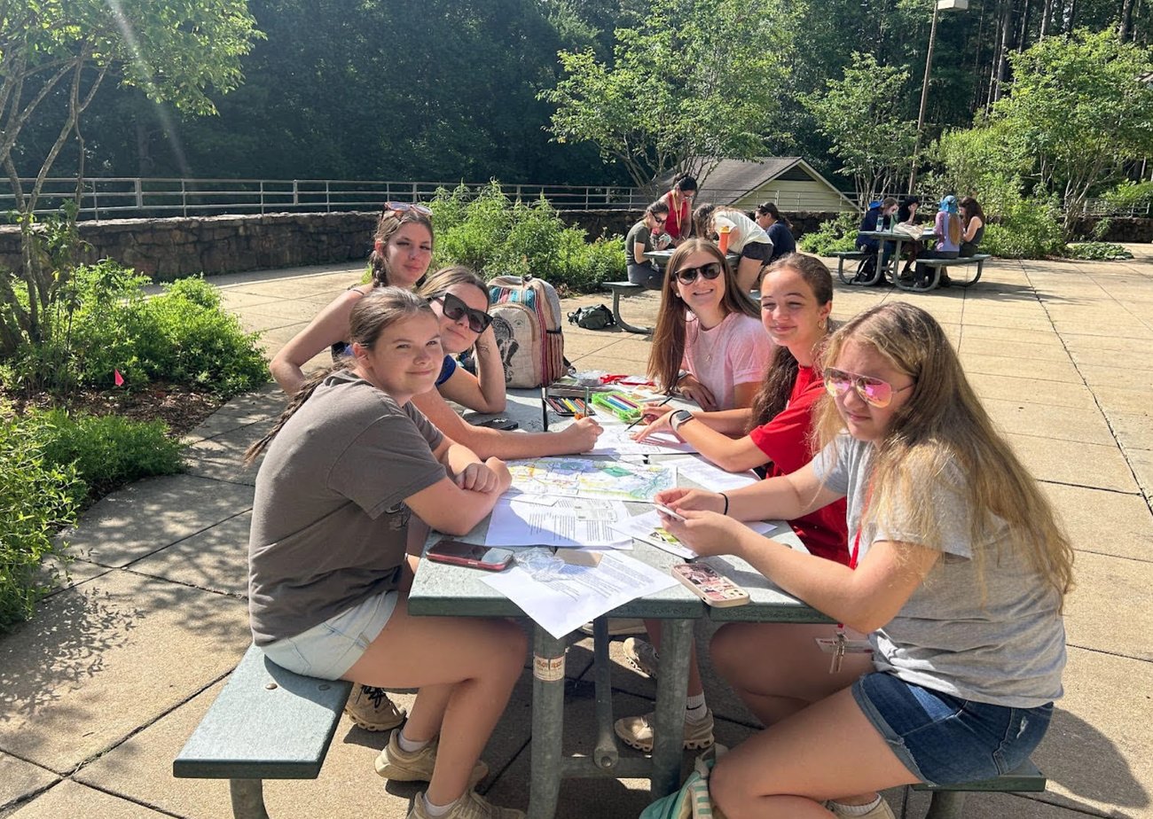 Students working on an assignment outside