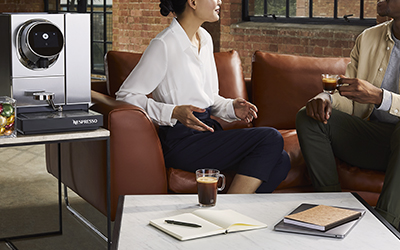 Teachers chatting over a cup of coffee