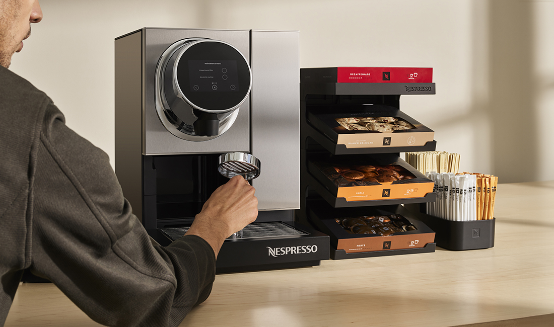 Man getting his Nespresso coffee