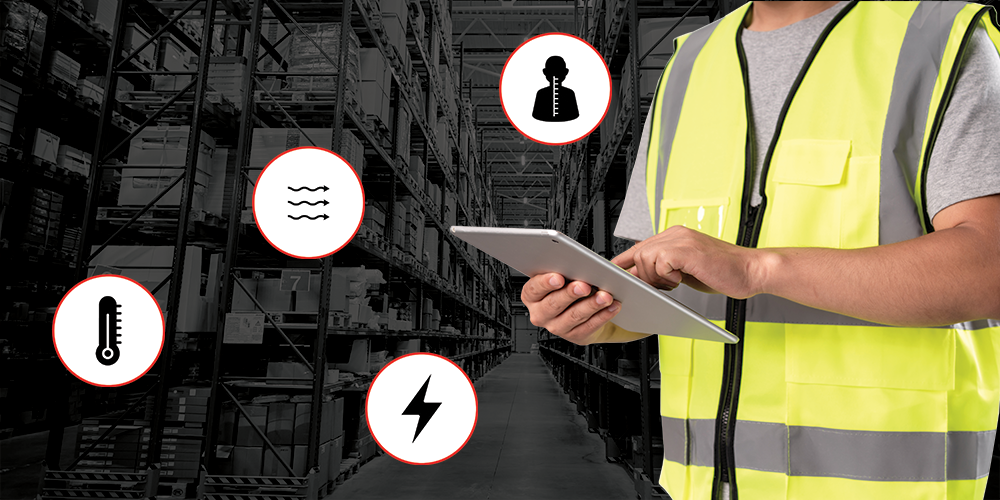 facility manager in warehouse ensuring compliance