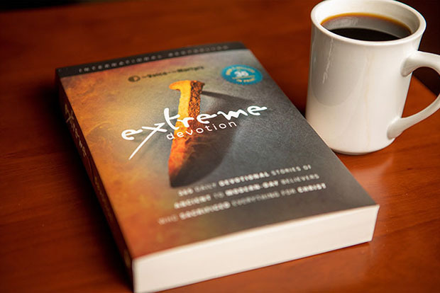 Extreme Devotion book on a table