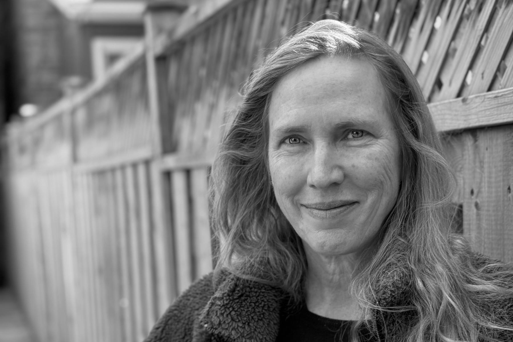A black and white photo of author Miriam Toews.